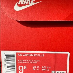 Nike Air Vapormax Plus in Black and Total Orange